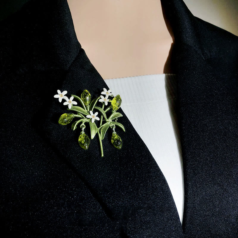 Spilla da donna a forma di goccia di limone con pianta verde - image 1