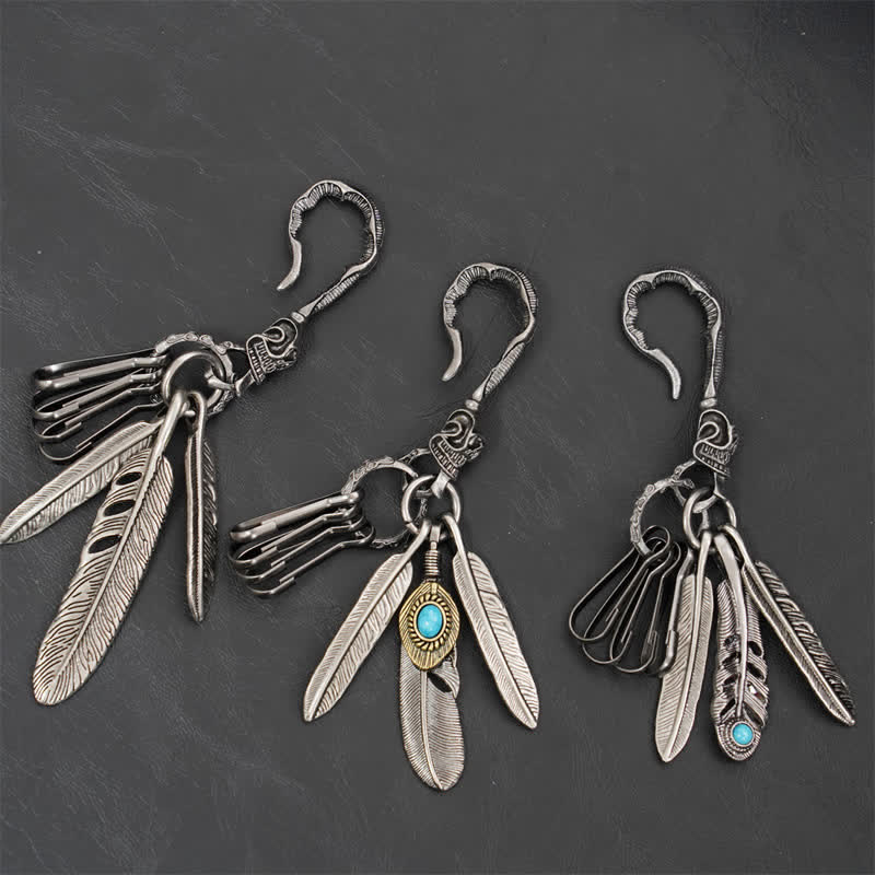 Portachiavi in pelle turchese blu con piume di teschio boho - image 1