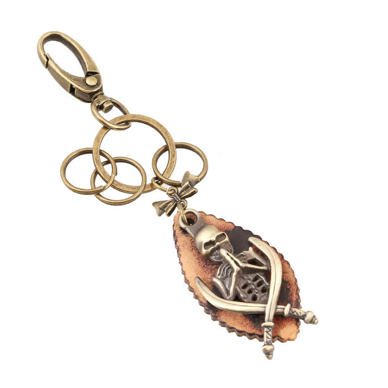 Portachiavi in pelle placcata in bronzo con scheletro punk - image 1