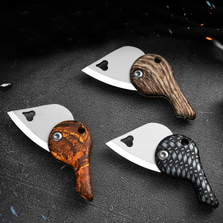 Portachiavi con coltello tascabile pieghevole a forma di cuore con lama cava - image 4