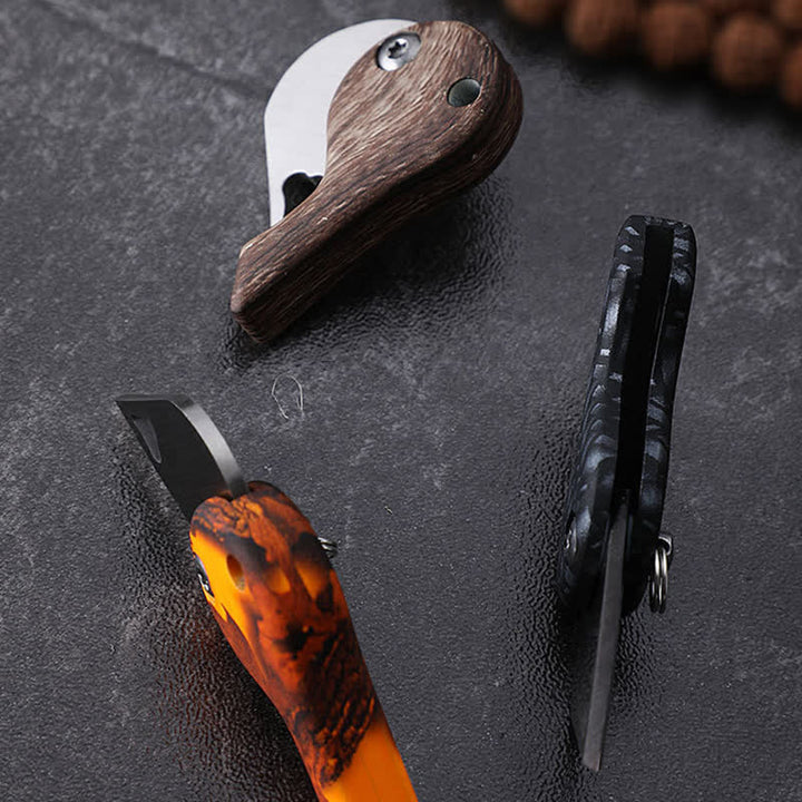 Portachiavi con coltello tascabile pieghevole a forma di cuore con lama cava - image 5