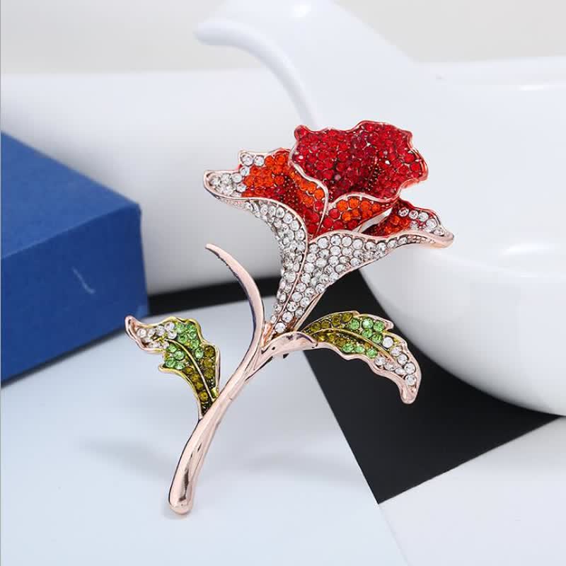 Graziosa spilla con fiore di orchidea e strass - image 1