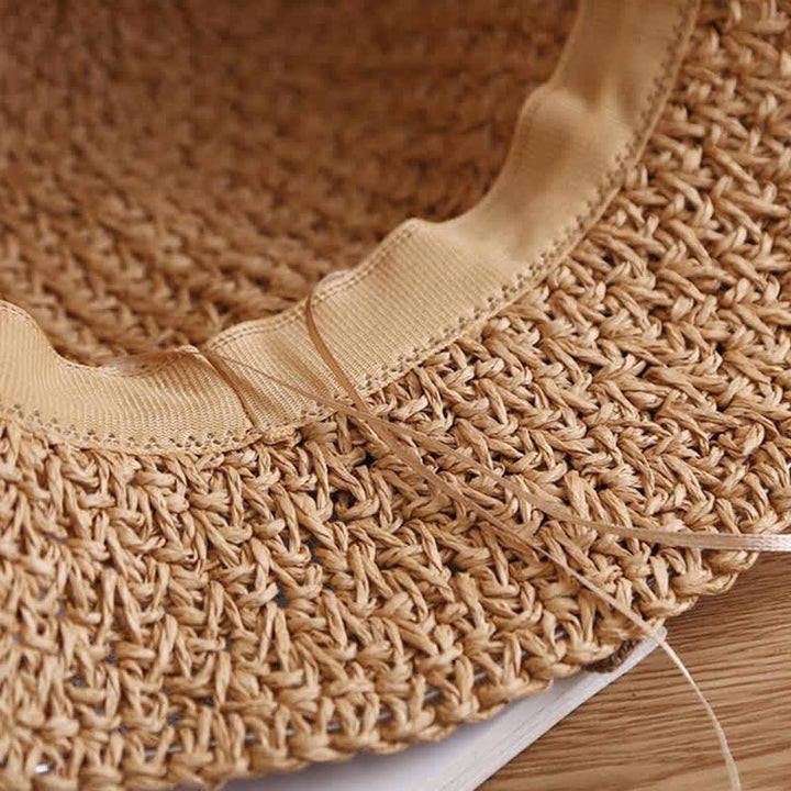 Cappello da sole pieghevole in paglia con nodo a fiocco, lavorato all'uncinetto sulla spiaggia - image 4