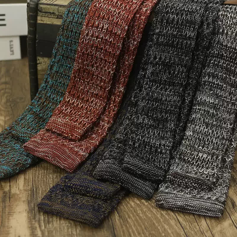 Cravatta lavorata a maglia di colore scuro variegato da uomo - image 1