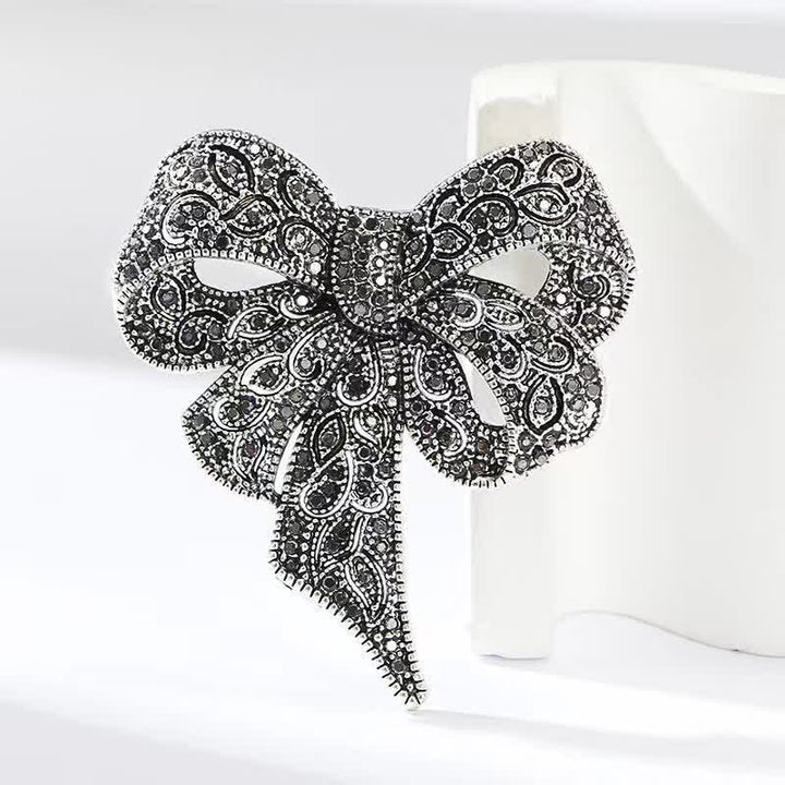 Spilla da donna in argento antico a forma di fiocco con strass - Argento antico - image 0