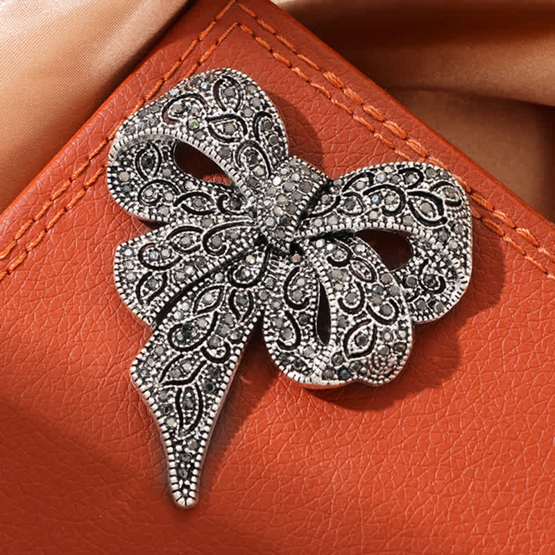 Spilla da donna in argento antico a forma di fiocco con strass - image 6