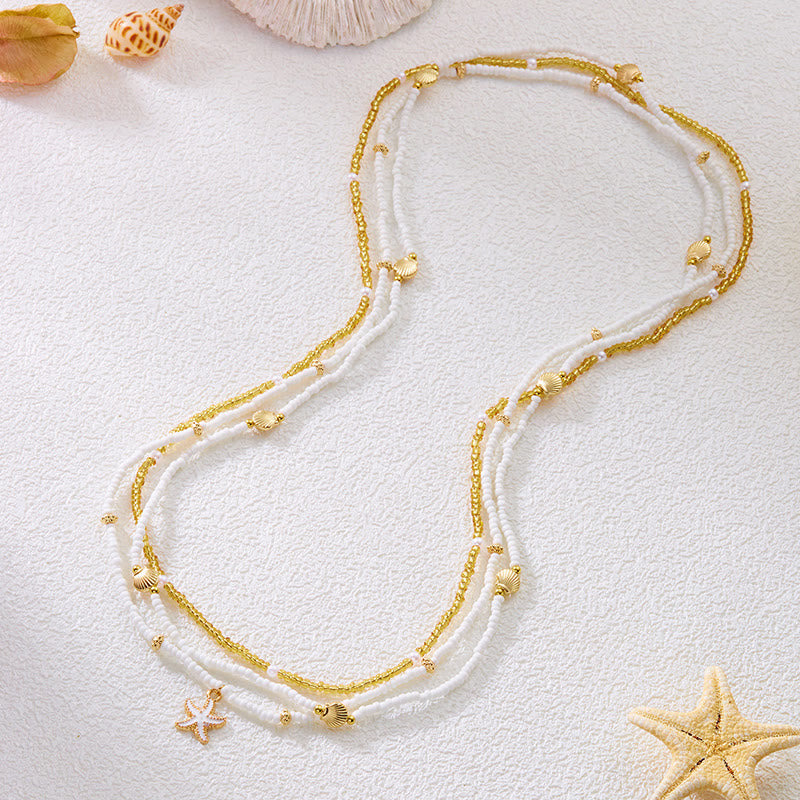 Catena da vita per donna in stile boho da spiaggia, con perline di conchiglia e stelle marine multistrato - image 2