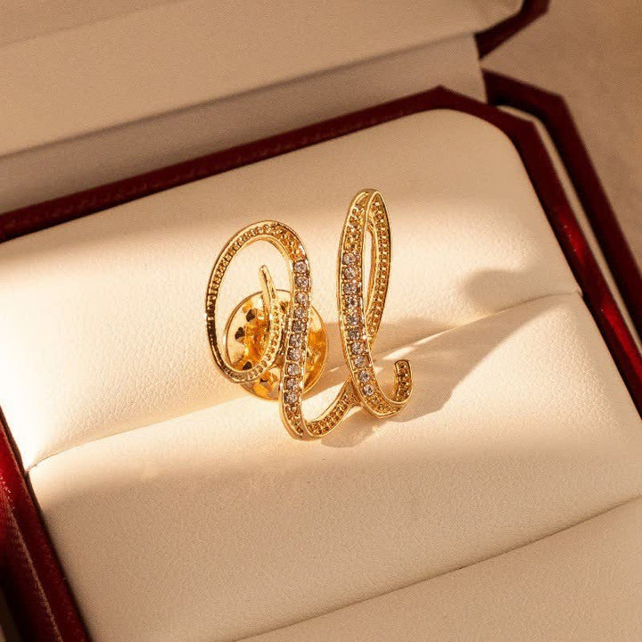 Spilla con lettera iniziale in oro 26 dell'alfabeto con strass - U - image 21