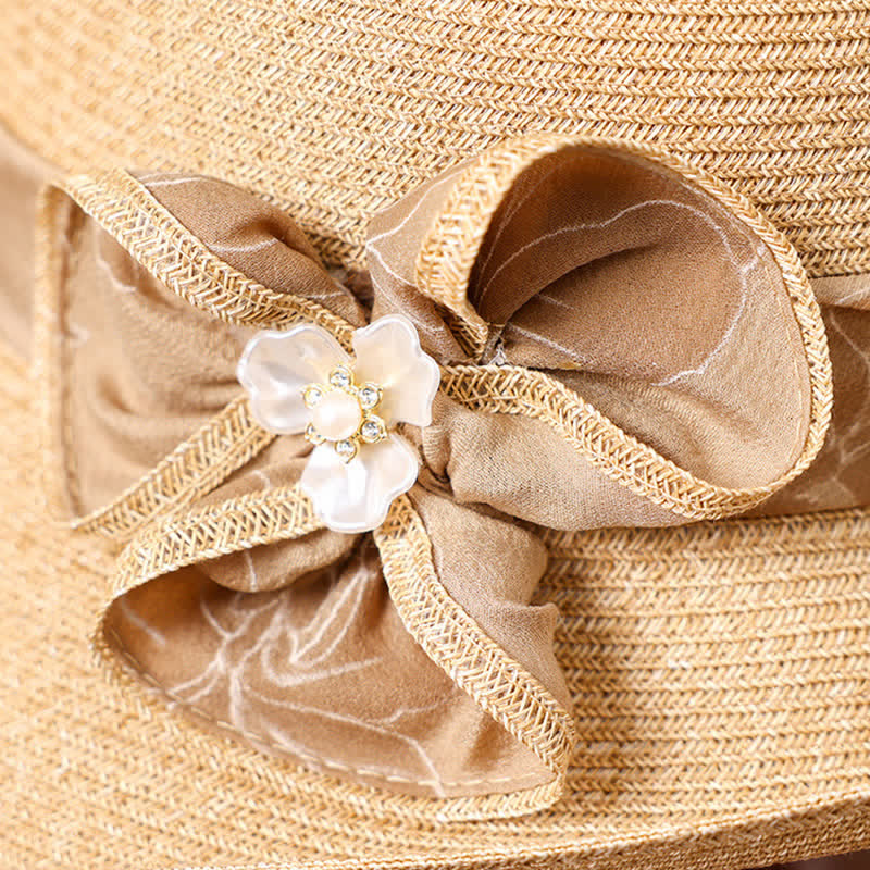 Cappello da donna in paglia con decorazione a margherita e nastro floreale - image 3