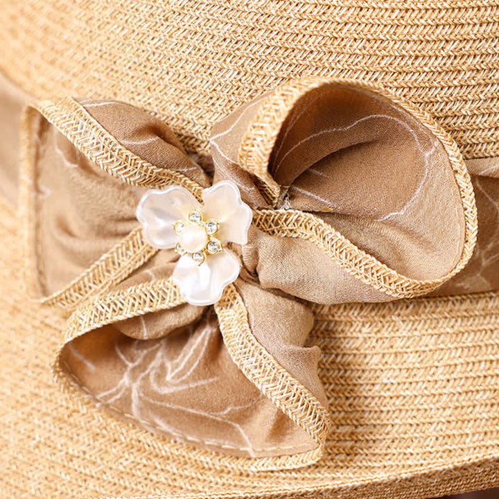 Cappello da donna in paglia con decorazione a margherita e nastro floreale - image 3