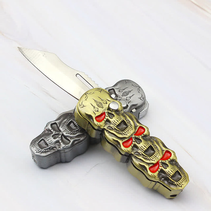Accendino a butano ricaricabile con triplo teschio e coltello - image 4