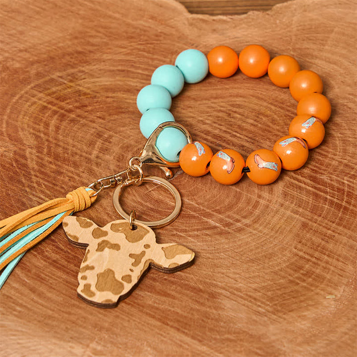 Bracciale da polso in perline di legno di mucca con nappa - Scarpe - image 2