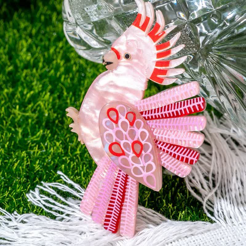 Spilla fatta a mano in acrilico a forma di pappagallo rosa - image 2