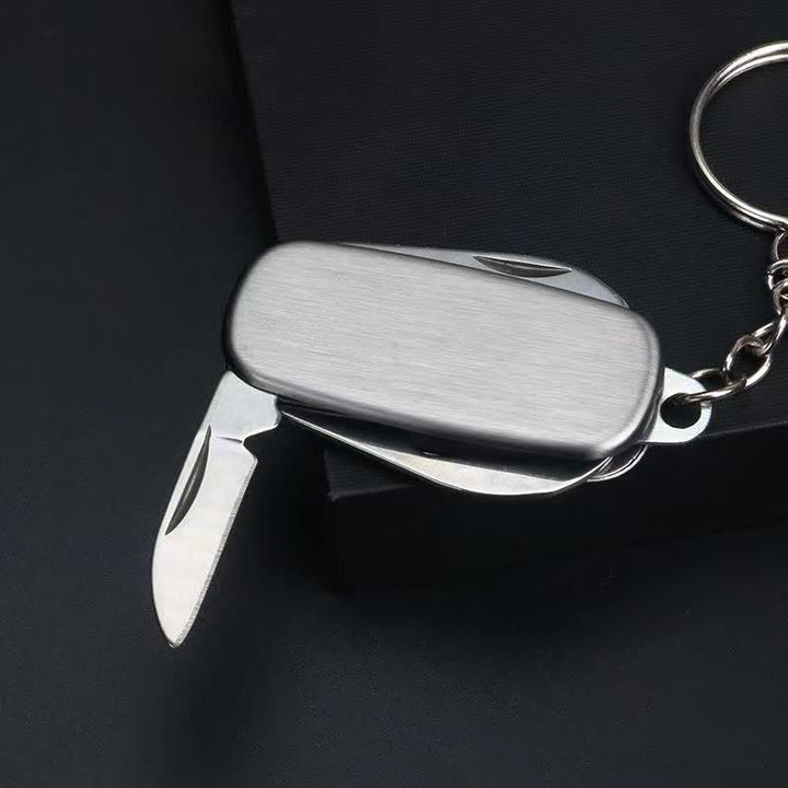 Portachiavi con coltello pieghevole compatto in argento e apribottiglie - image 2