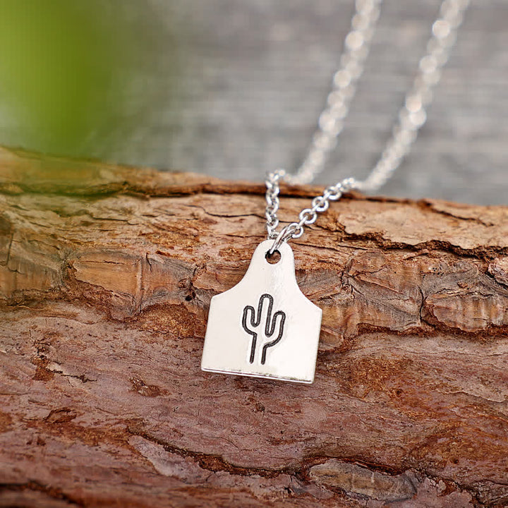 Collana in acciaio inossidabile con iniziale personalizzata in argento con mini targhetta per bovini - Oro - image 1