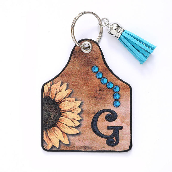 Portachiavi in pelle con nappa a forma di girasole e lettera in stile occidentale - G - image 8
