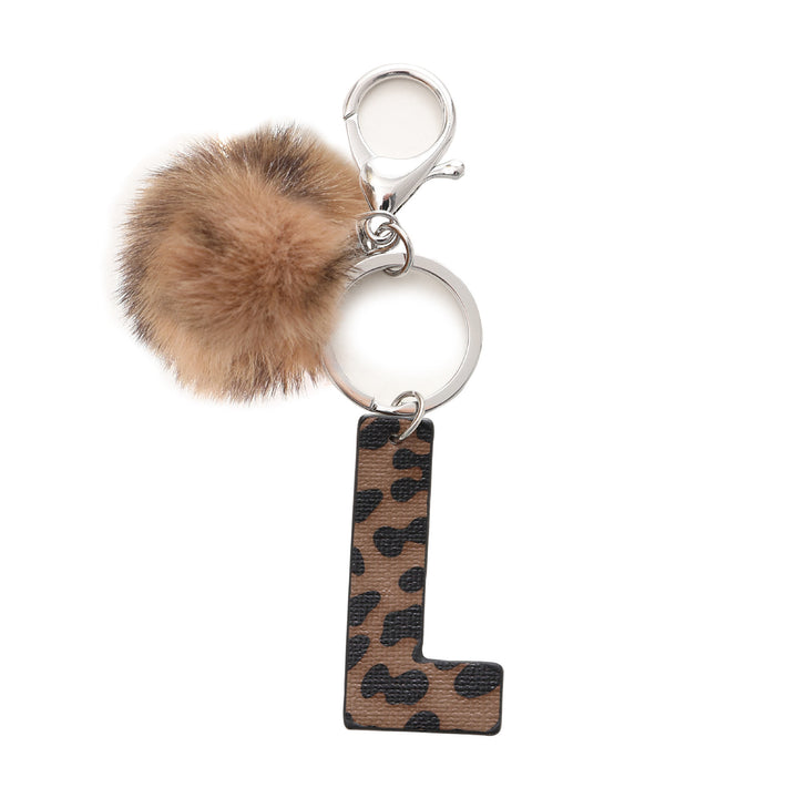 Portachiavi in pelle con lettera stampata leopardata in stile western e palla di peluche - L - image 13