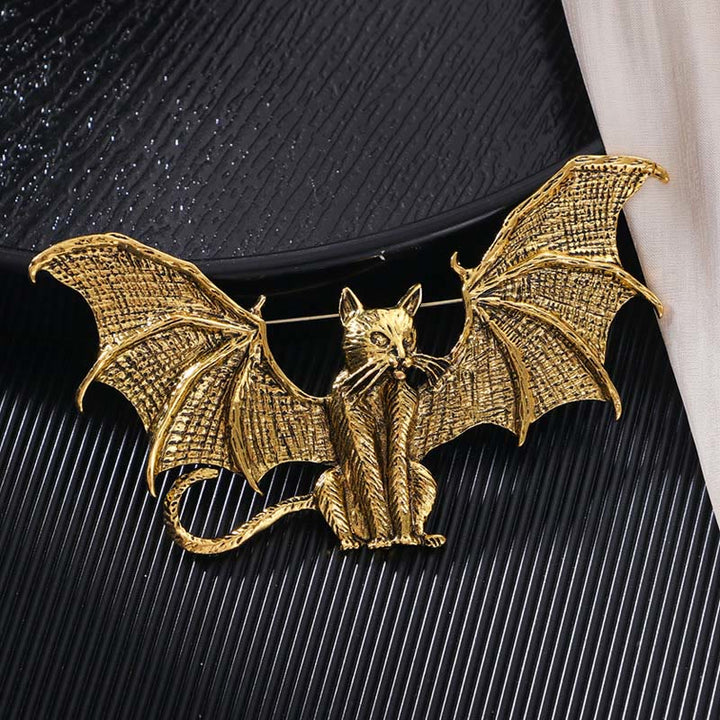 Spilla a forma di gatto alato in oro e argento per Halloween - D'oro - image 0