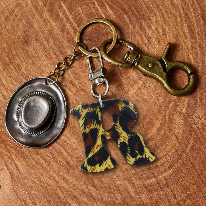 Portachiavi con ciondolo a forma di lettera con stampa leopardata e cappello da cowboy - Portachiavi in ottone + cappello in argento - R - image 25
