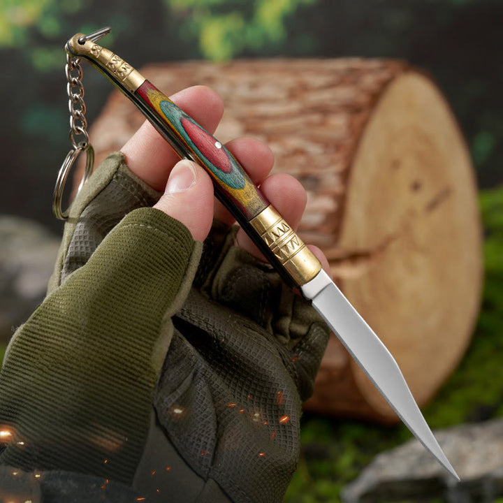 Coltello pieghevole da esterno con manico colorato e collana con mano di Buddha in cristallo bianco - image 3