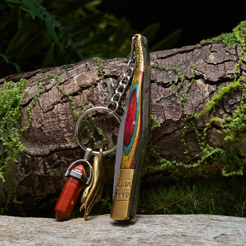 Coltello pieghevole in ottone colorato con mano di Buddha e collana in pietra rossa - Collana con coltello pieghevole - image 0