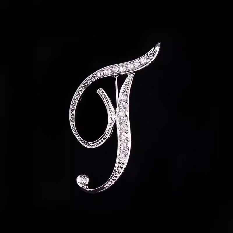 Spilla con iniziale in oro e argento e diamanti intarsiati - Argento - T - image 41