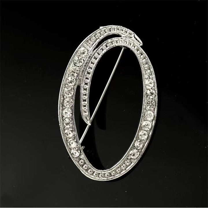 Spilla con iniziale in oro e argento e diamanti intarsiati - Argento - O - image 37