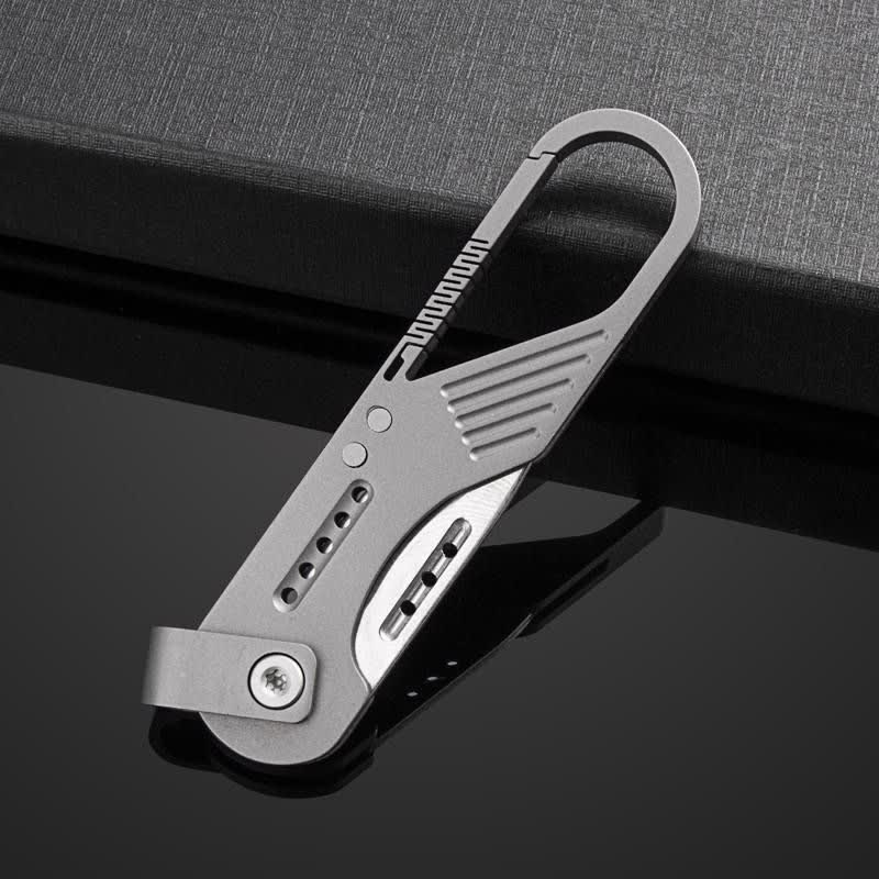 Coltello pieghevole in stile titanio, strumento EDC con moschettone - image 1