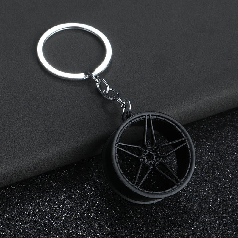 Collezione di portachiavi con design di mini auto moderne - Grande Ruota Nera - image 10