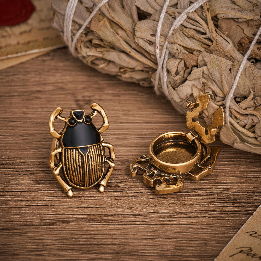 1 paio di copribottoni a scatto con sigillo a forma di scarabeo per camicia. - image 1