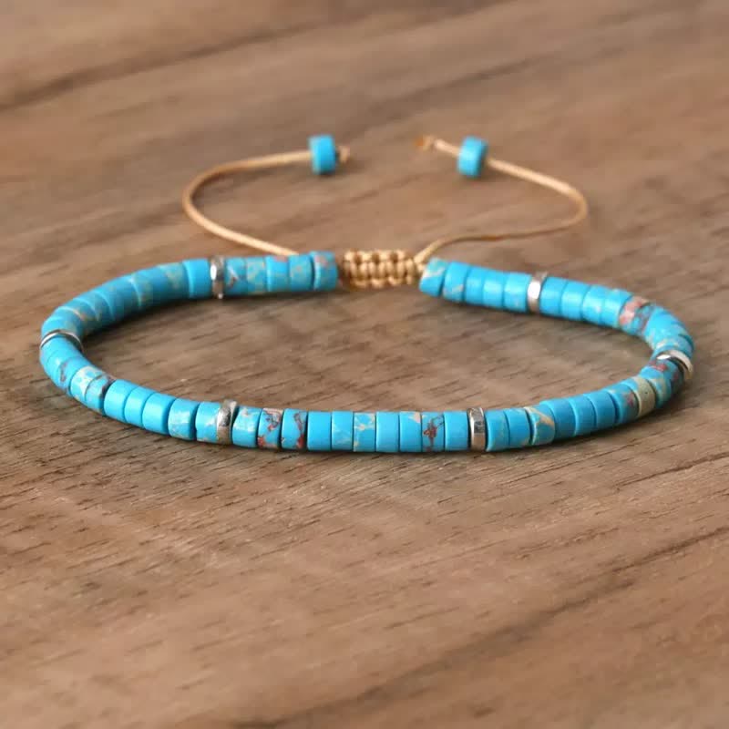 Bracciale regolabile con cordino e perline turchesi a disco. - Blu - image 2