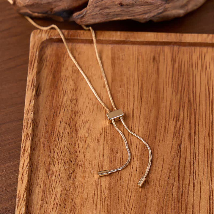 Collana bolo minimalista e delicata con chiusura regolabile a cursore. - Oro - image 0