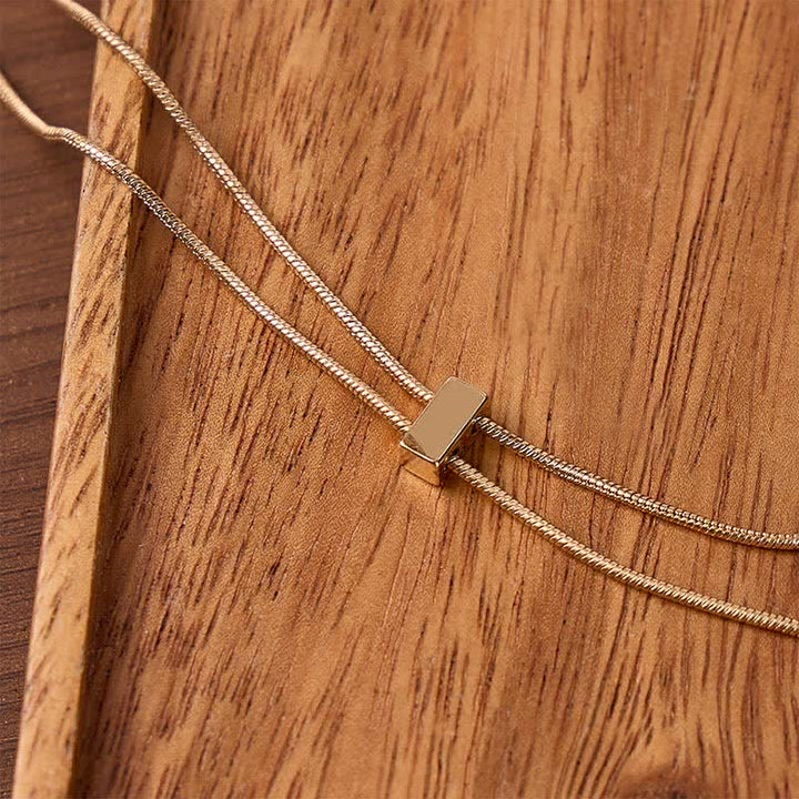 Collana bolo minimalista e delicata con chiusura regolabile a cursore. - image 2