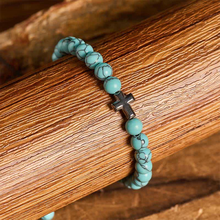 Bracciale regolabile con croce della fede e perline turchesi - image 2