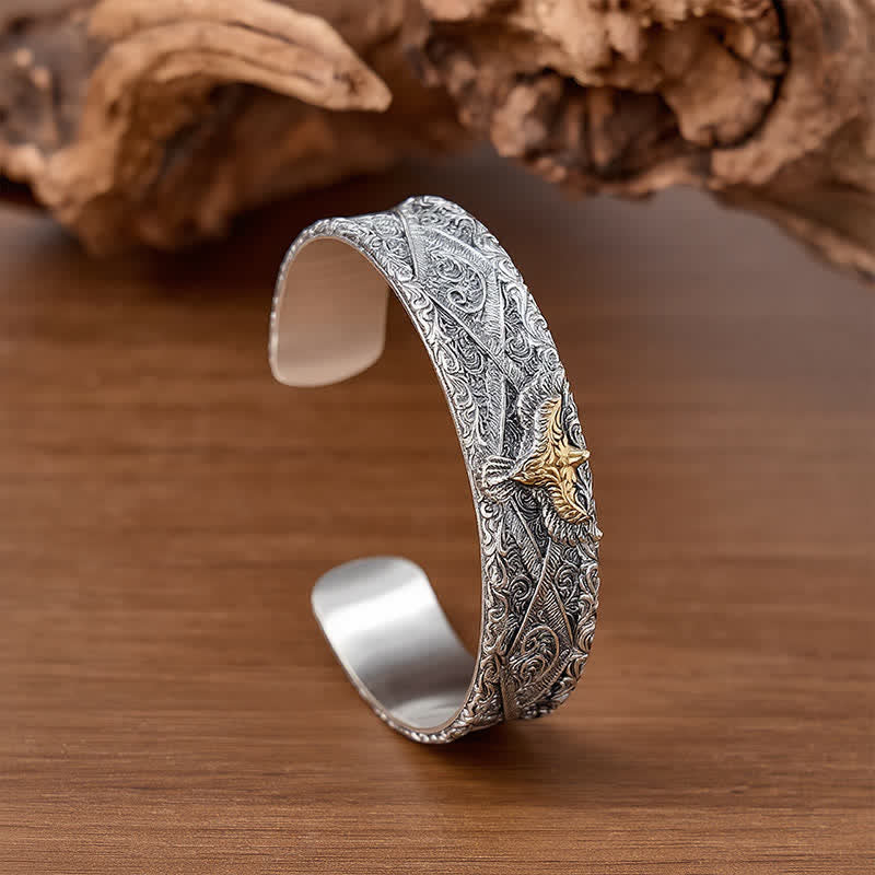 Bracciale a polsino aperto con aquila occidentale e incisioni a volute. - image 3