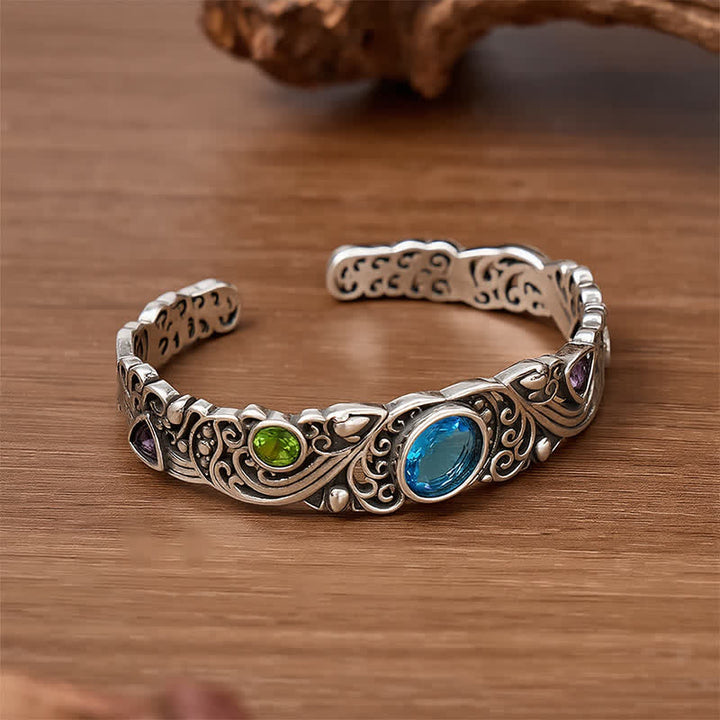 Bracciale a polsino aperto con pietre preziose decorate. - image 4