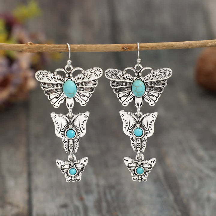 Orecchini pendenti stile boho con tripla farfalla turchese. - Argento - image 0