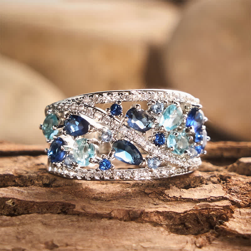 Anello da donna a fascia larga con pavé di zirconi e pietre multiple. - Blu oceano - US 10 - image 0
