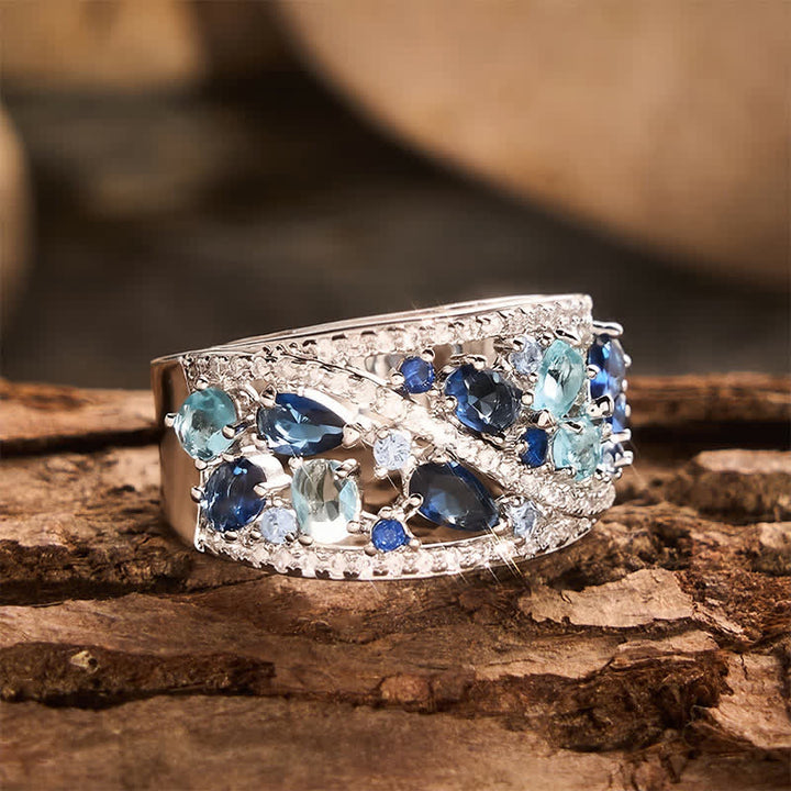 Anello da donna a fascia larga con pavé di zirconi e pietre multiple. - image 4