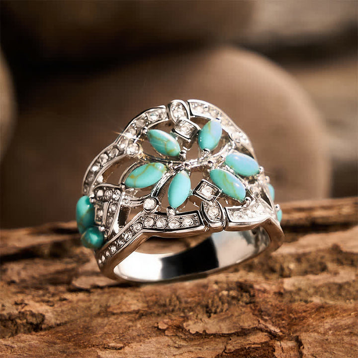 Anello in stile etnico retrò con fascia larga cava, con turchese simulato e cristalli. - Tonalità argento - US 9 - image 0