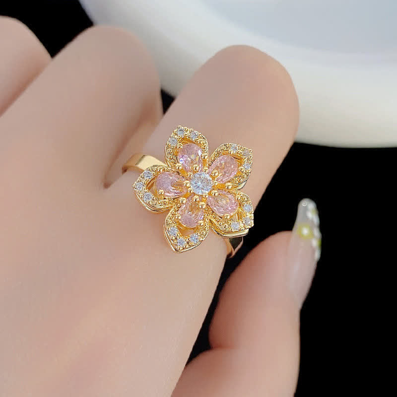 Anello antistress girevole con zirconi a forma di fiore di ciliegio - image 3