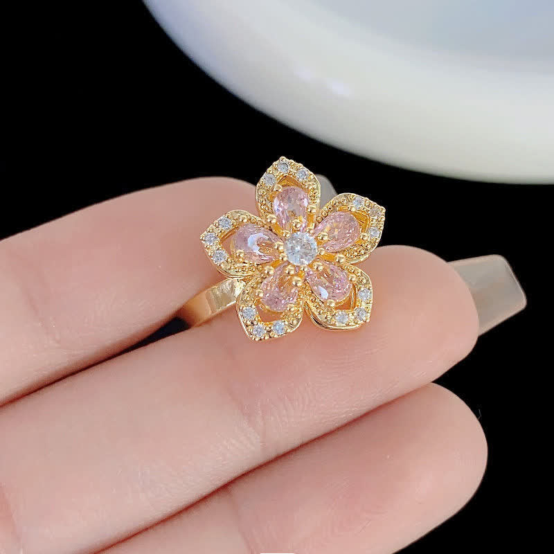 Anello antistress girevole con zirconi a forma di fiore di ciliegio - image 4