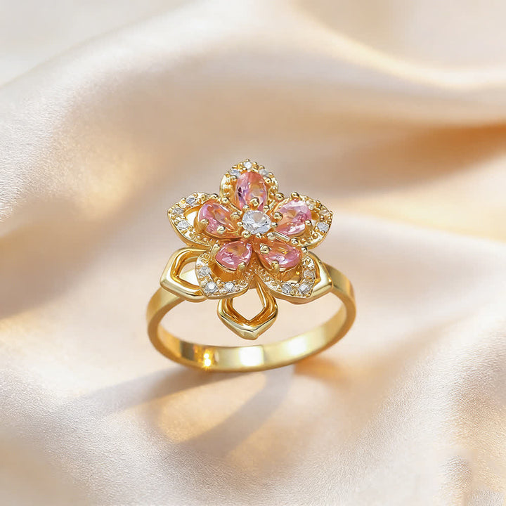 Anello antistress girevole con zirconi a forma di fiore di ciliegio - Rosa e oro - image 1