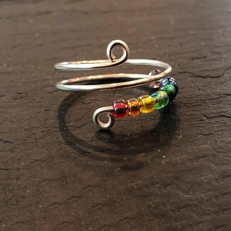 Anello antistress colorato con perline arcobaleno per la decompressione estetica - image 4