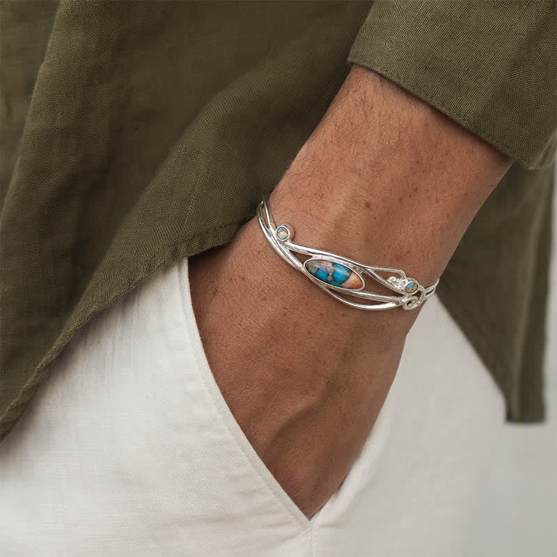 Bracciale a polsino aperto con motivo a foglie d'argento e vite incantata - image 1