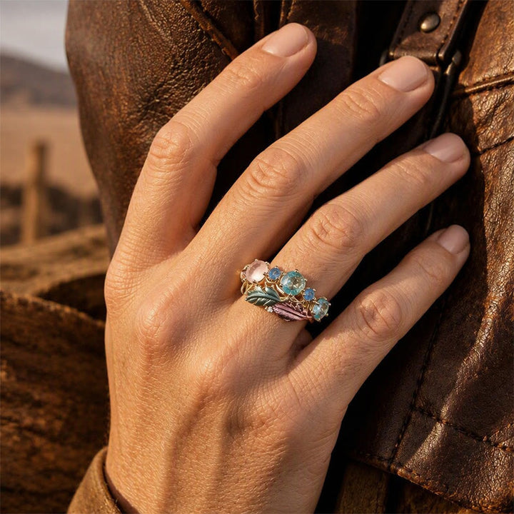 Anello da donna con piuma smaltata e cristalli intarsiati - image 1