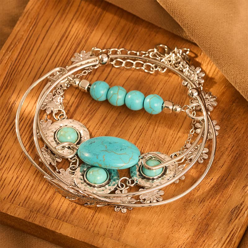 Set di 5 braccialetti impilabili Desert Muse con piume turchesi e fiori - image 1