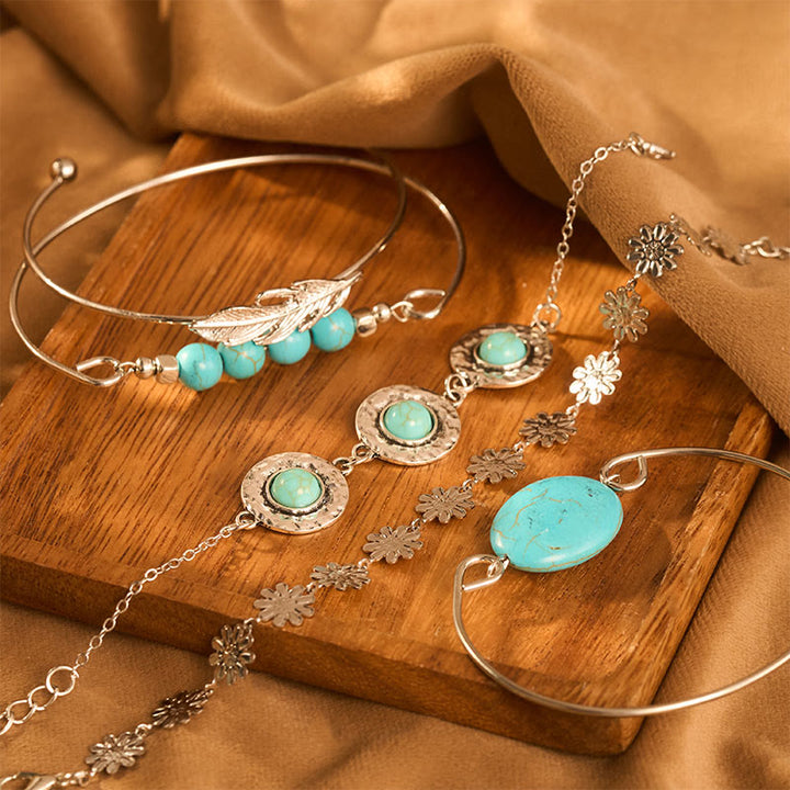 Set di 5 braccialetti impilabili Desert Muse con piume turchesi e fiori - image 0