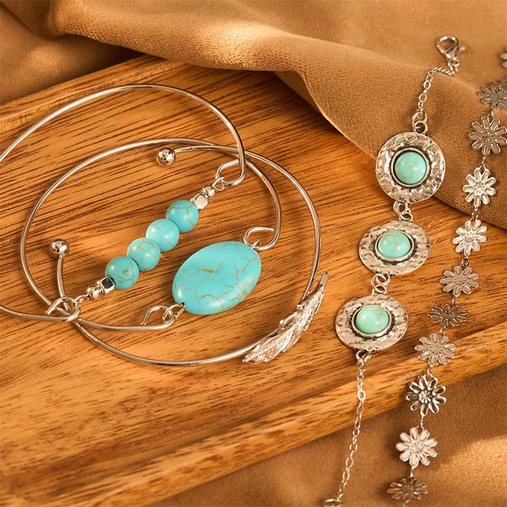Set di 5 braccialetti impilabili Desert Muse con piume turchesi e fiori - image 2