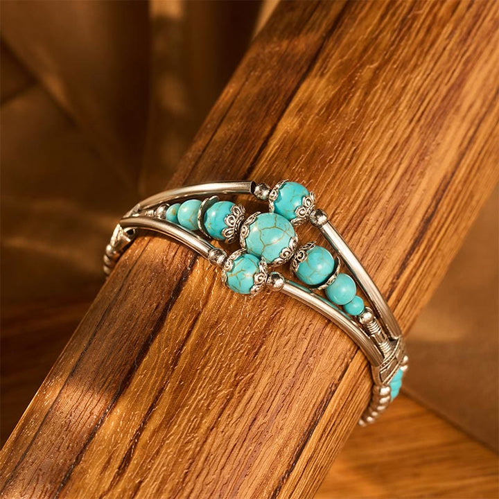 Bracciale vintage boho a triplo strato con piume turchesi e argento anticato - image 3